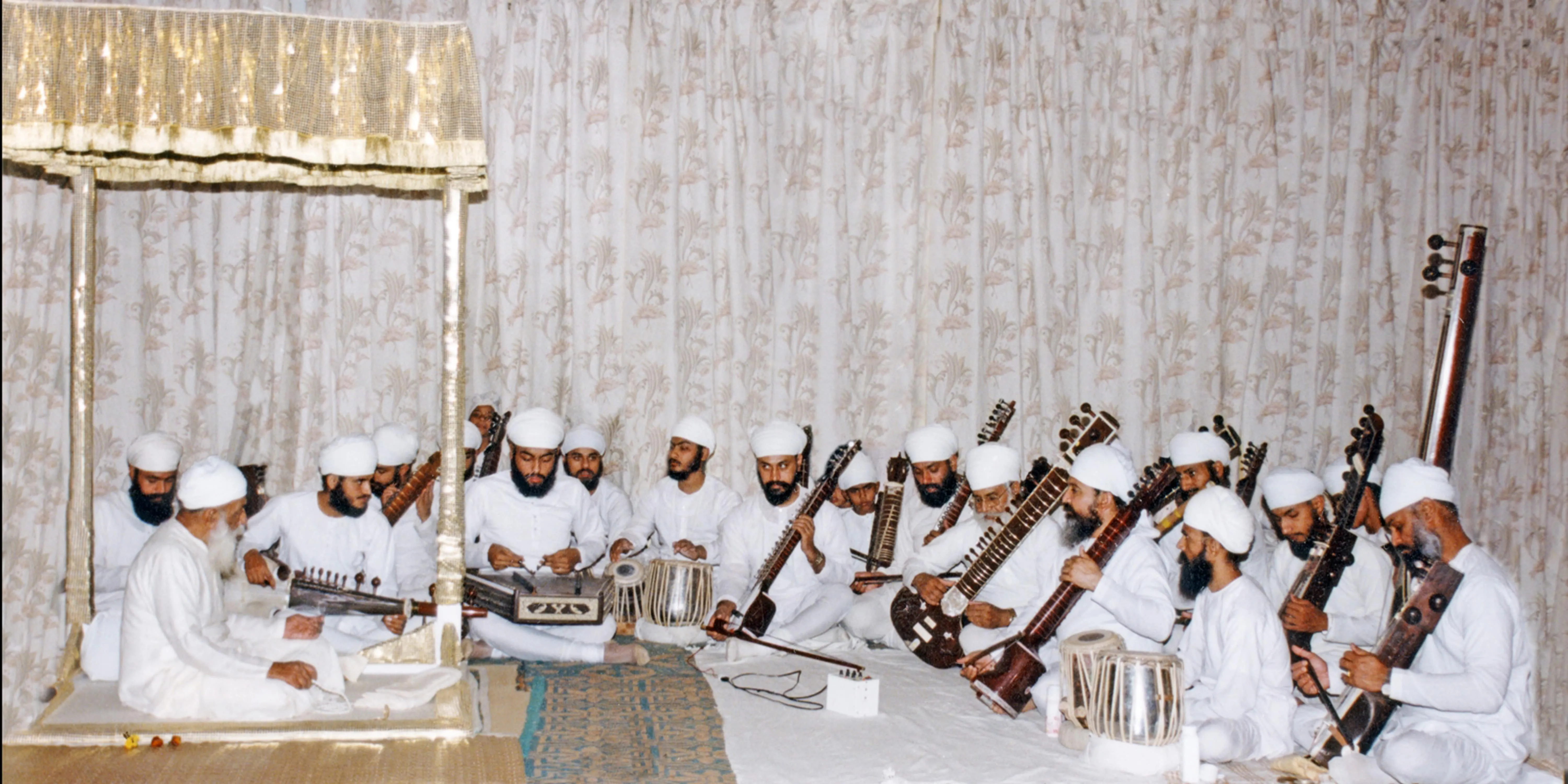 Sri Satguru ji, along with His disciples in a special music sitting.